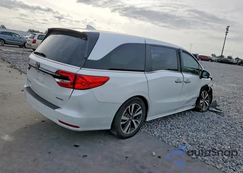 2022 Honda Odyssey Touring z USA, uszkodzony, nr VIN 5FNRL6H89NB043403